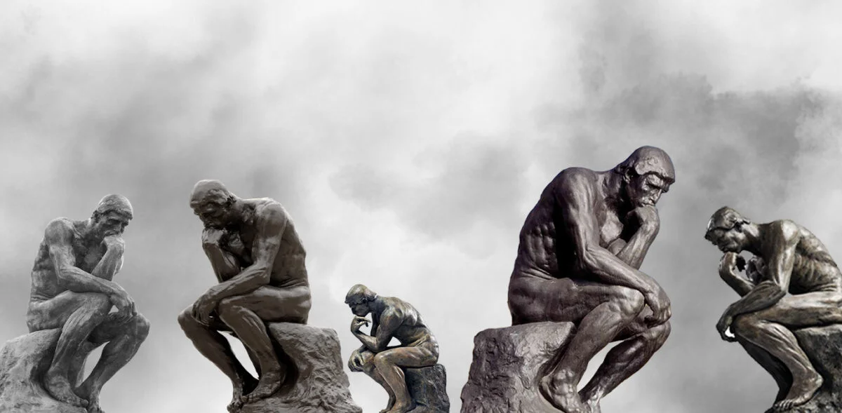 ما هو الاسم الأصلي لتمثال رودان؟ ولماذا قام بنحته؟